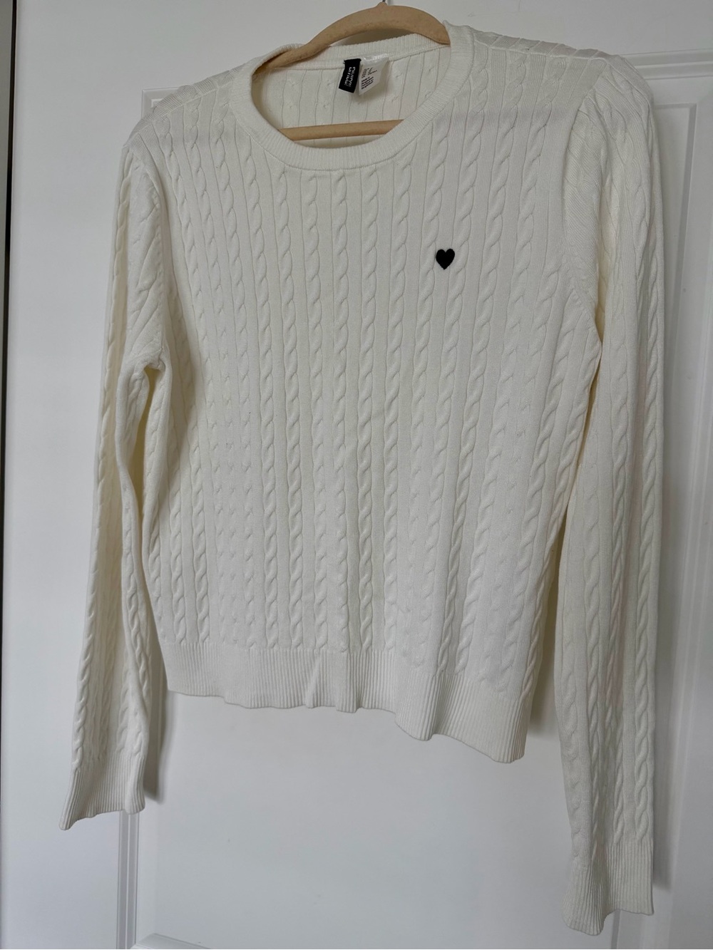 Divided Cream Cable-Knit Crewneck Sweater with Black Heart Patch